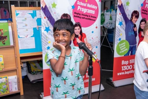 Mini Bopper party Boy singing at Mini Bopper Party