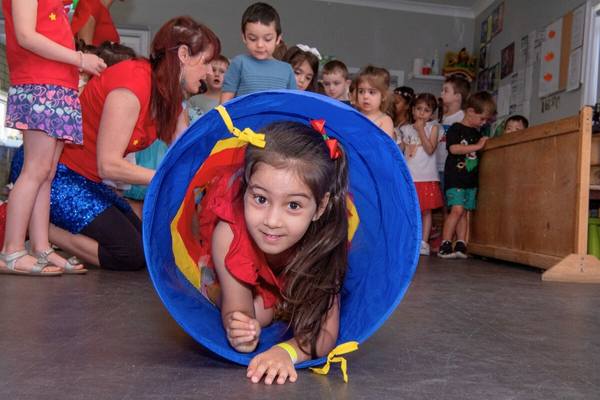 Girl tunnel at Bop till you Drop childcare and preschool disco